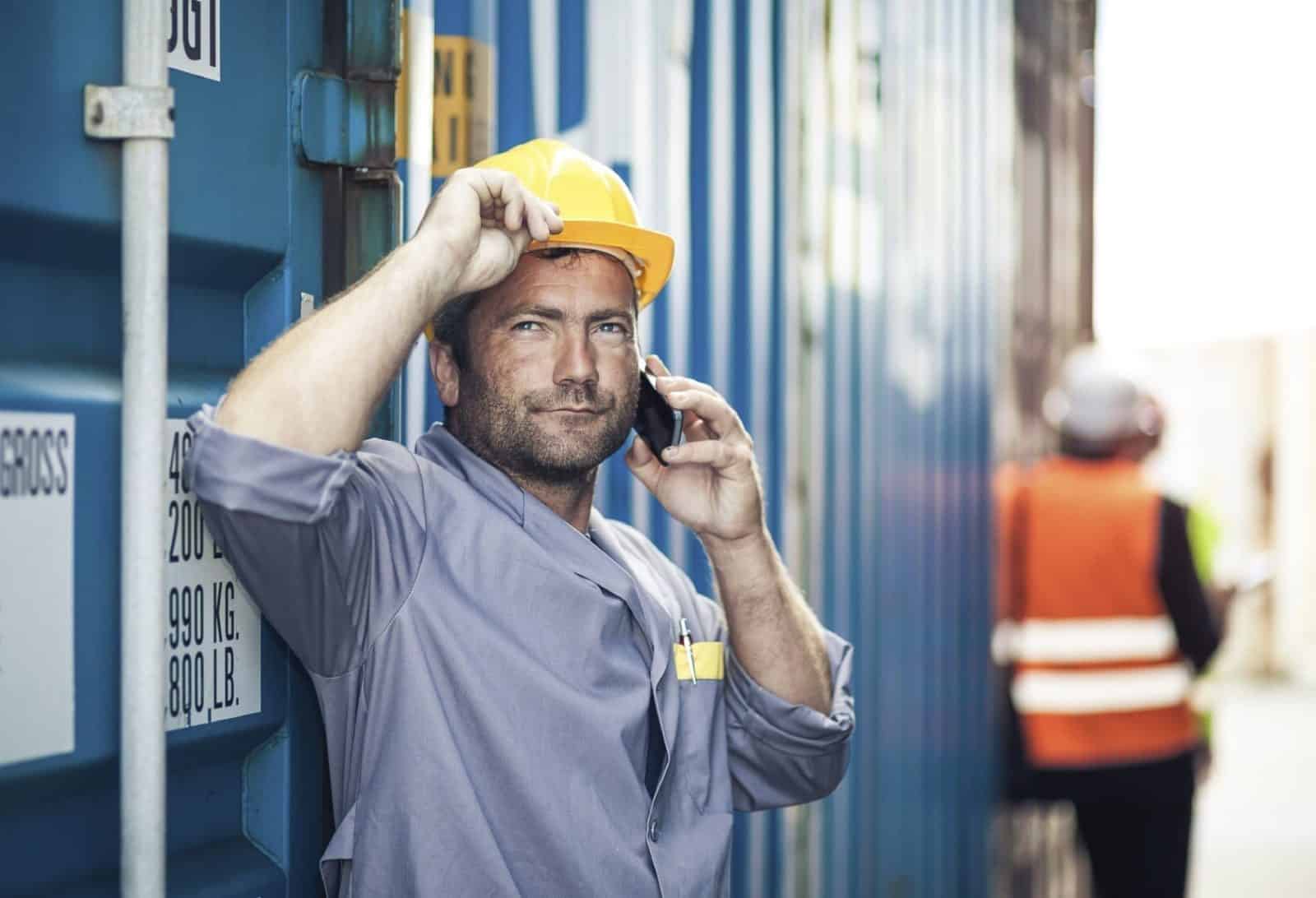 Construction Worker Talking On The Phone Stock Photo