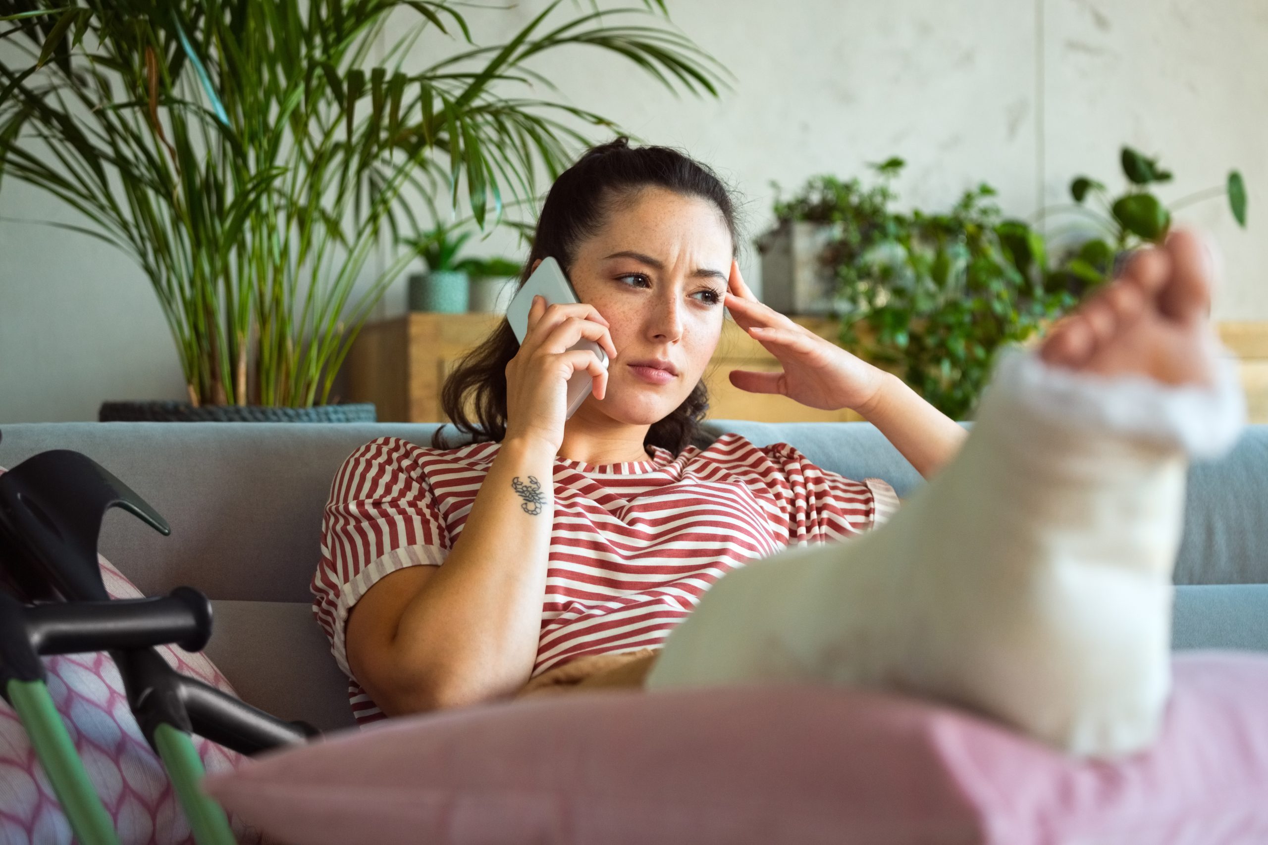 a woman calling a personal injury lawyer after an accident in Paterson, NJ