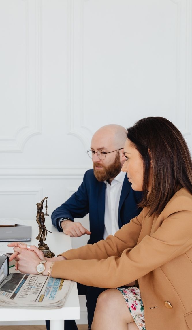 What To Do After an Accident woman seeking help from attorney for filing lawsuit
